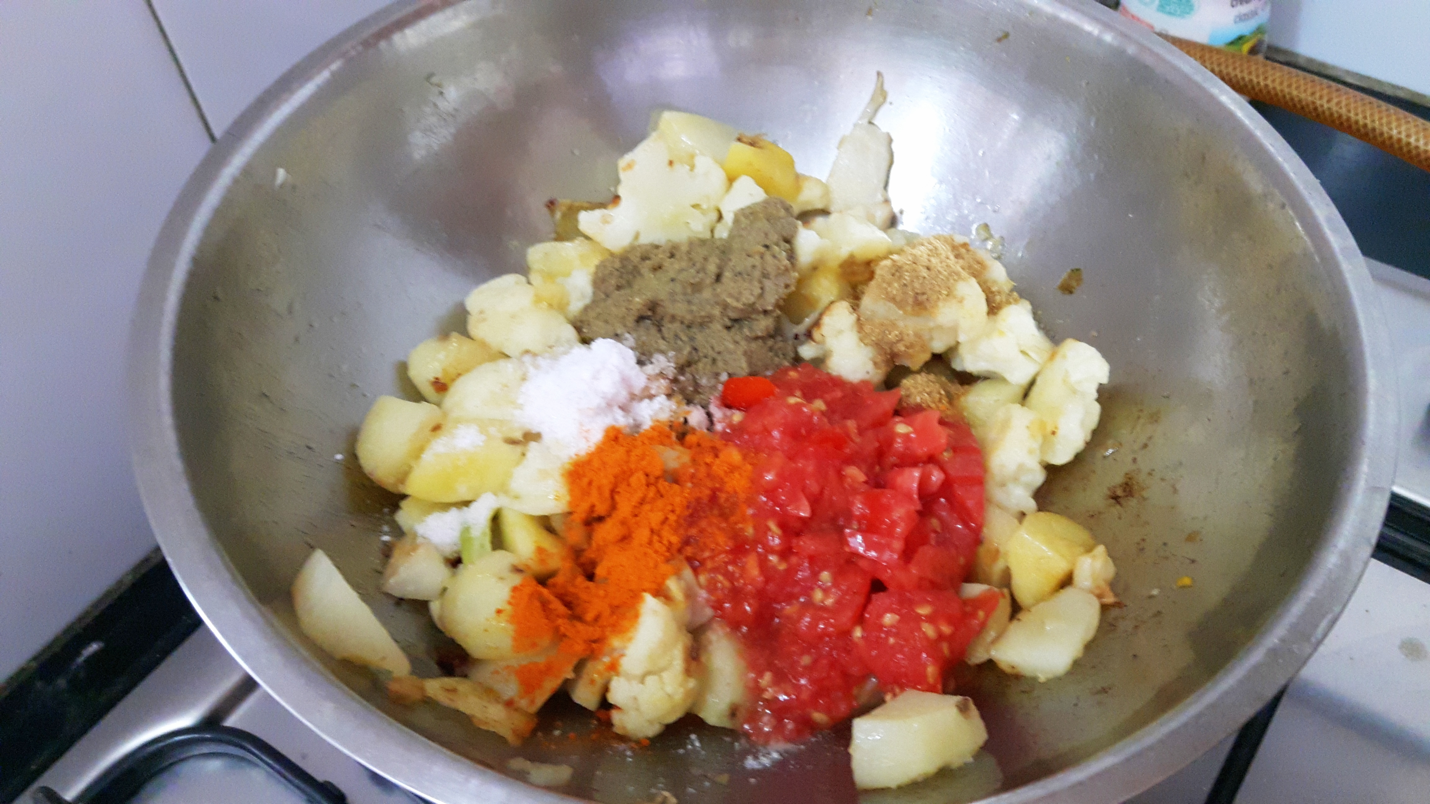 add salt, turmeric powder and coriander powder