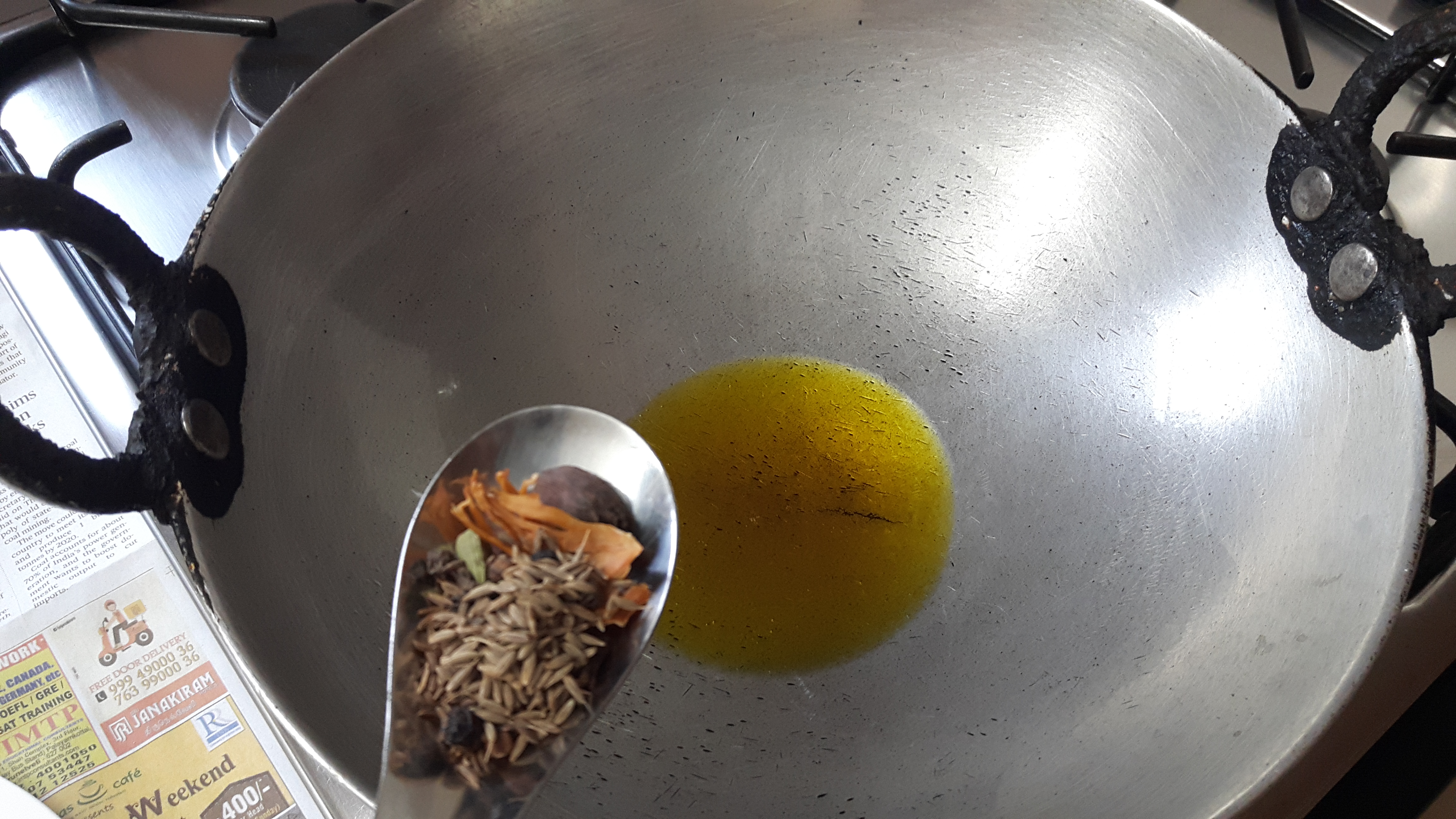 Put cardamom, cinnamon, bay leaf, cumin