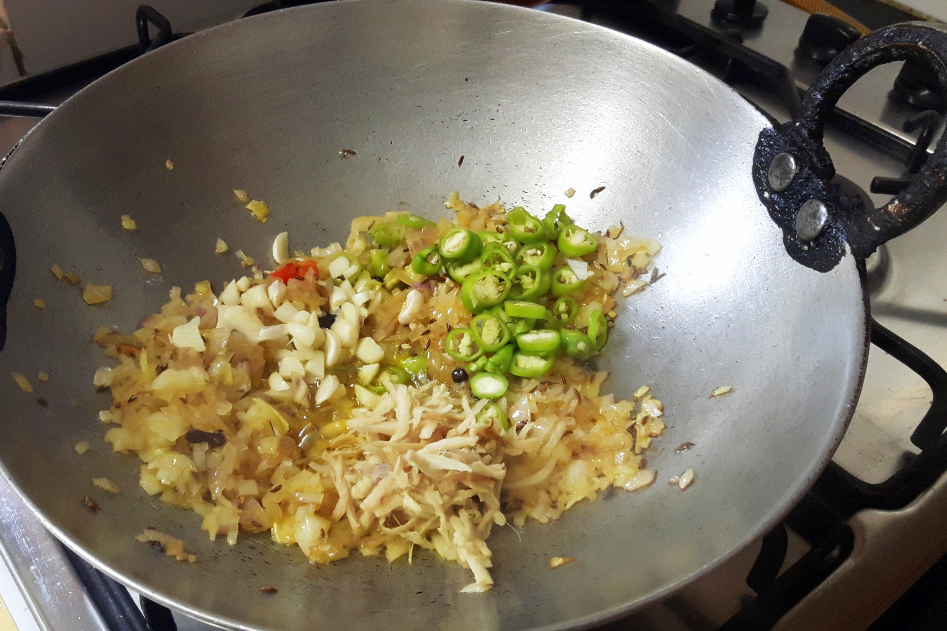 add chopped onion, green chili