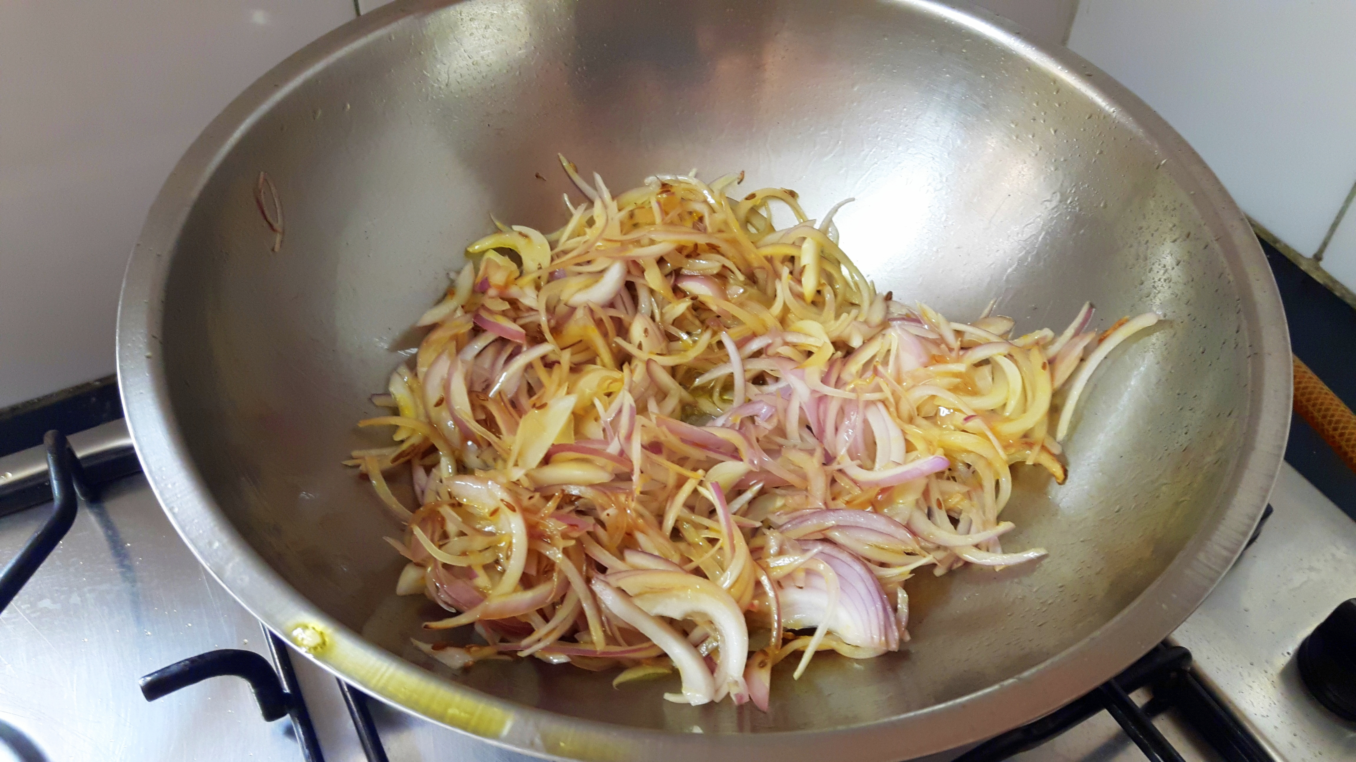 add longitudinally sliced onion