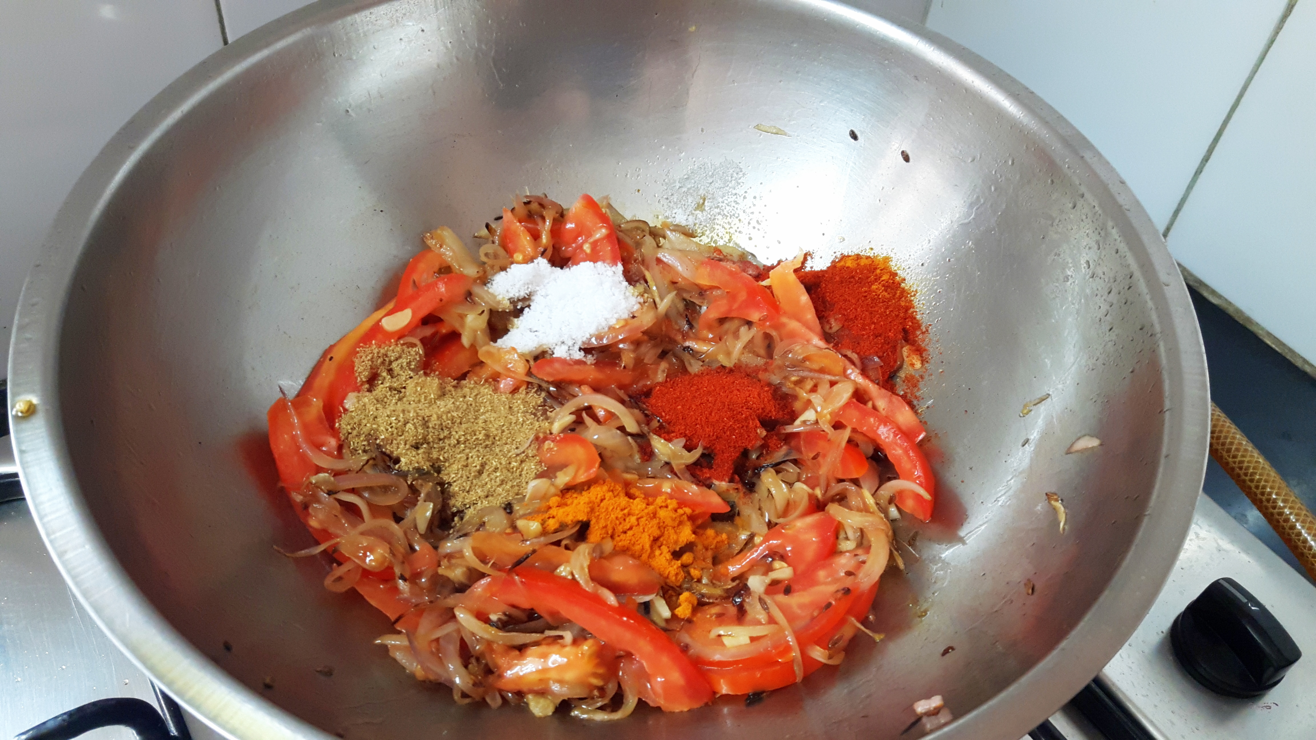 Add chili powder, coriander powder, turmeric powder and salt