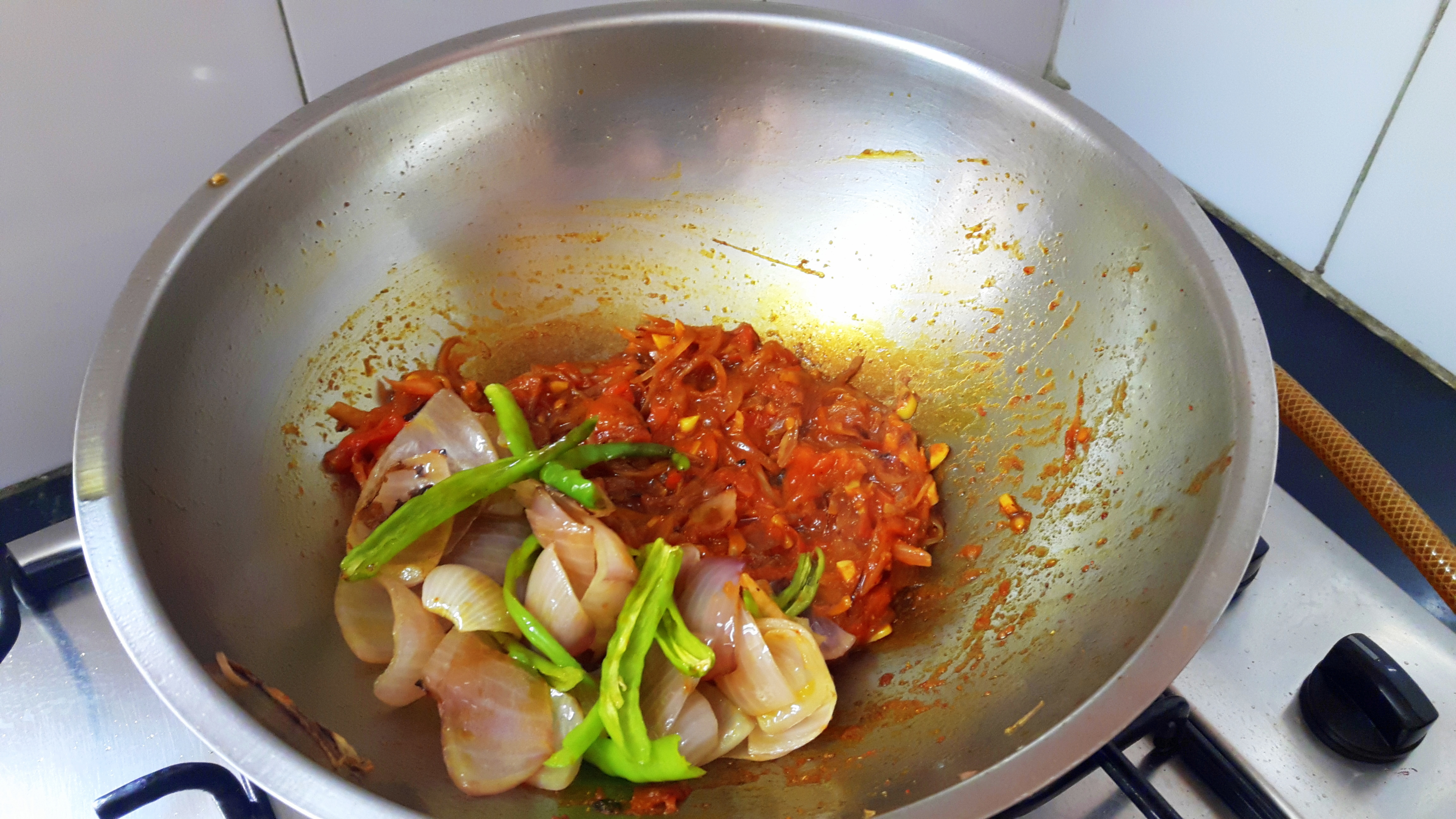add fried leaf of onion and green chili