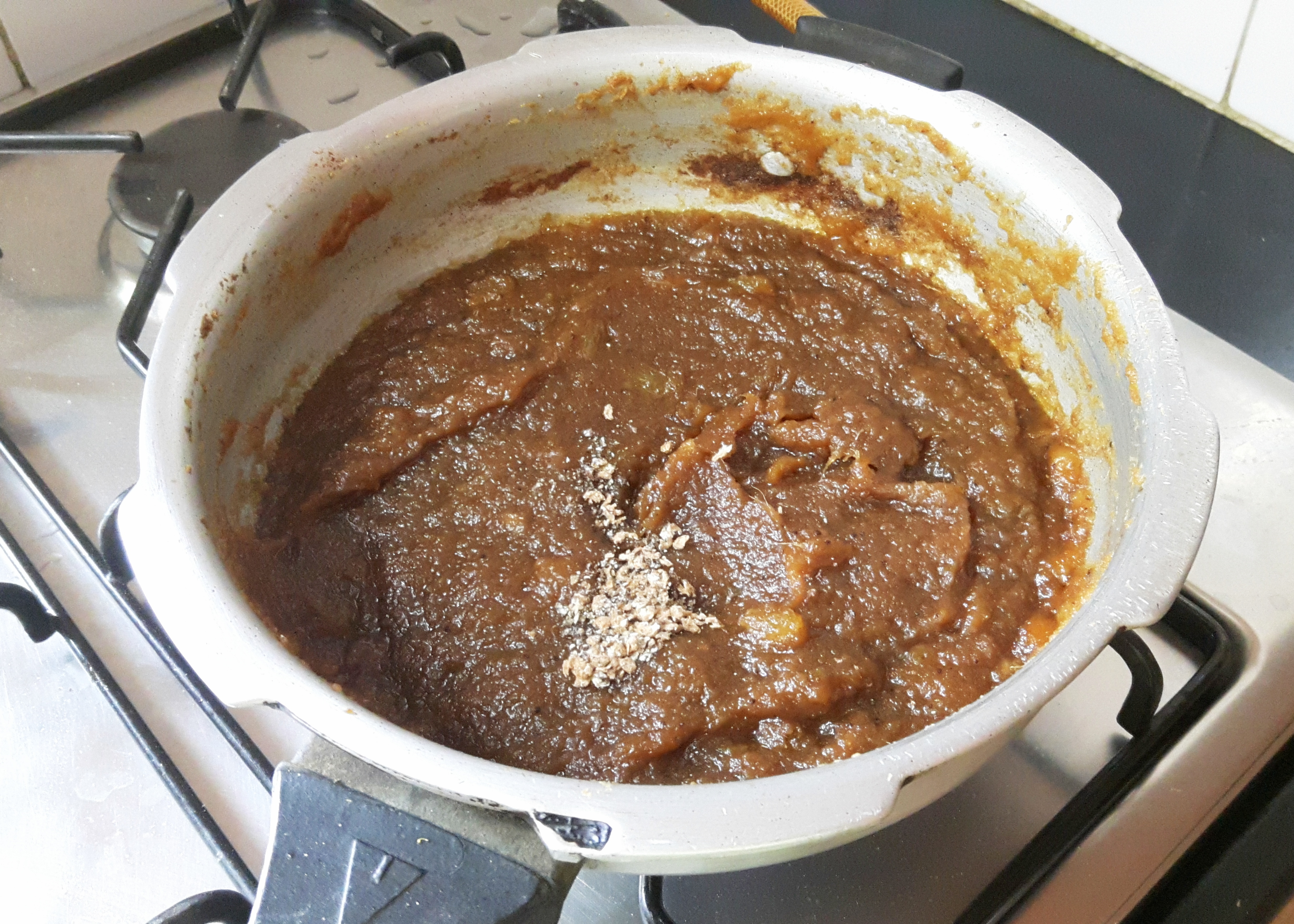 Add dry grapes and cardamom power