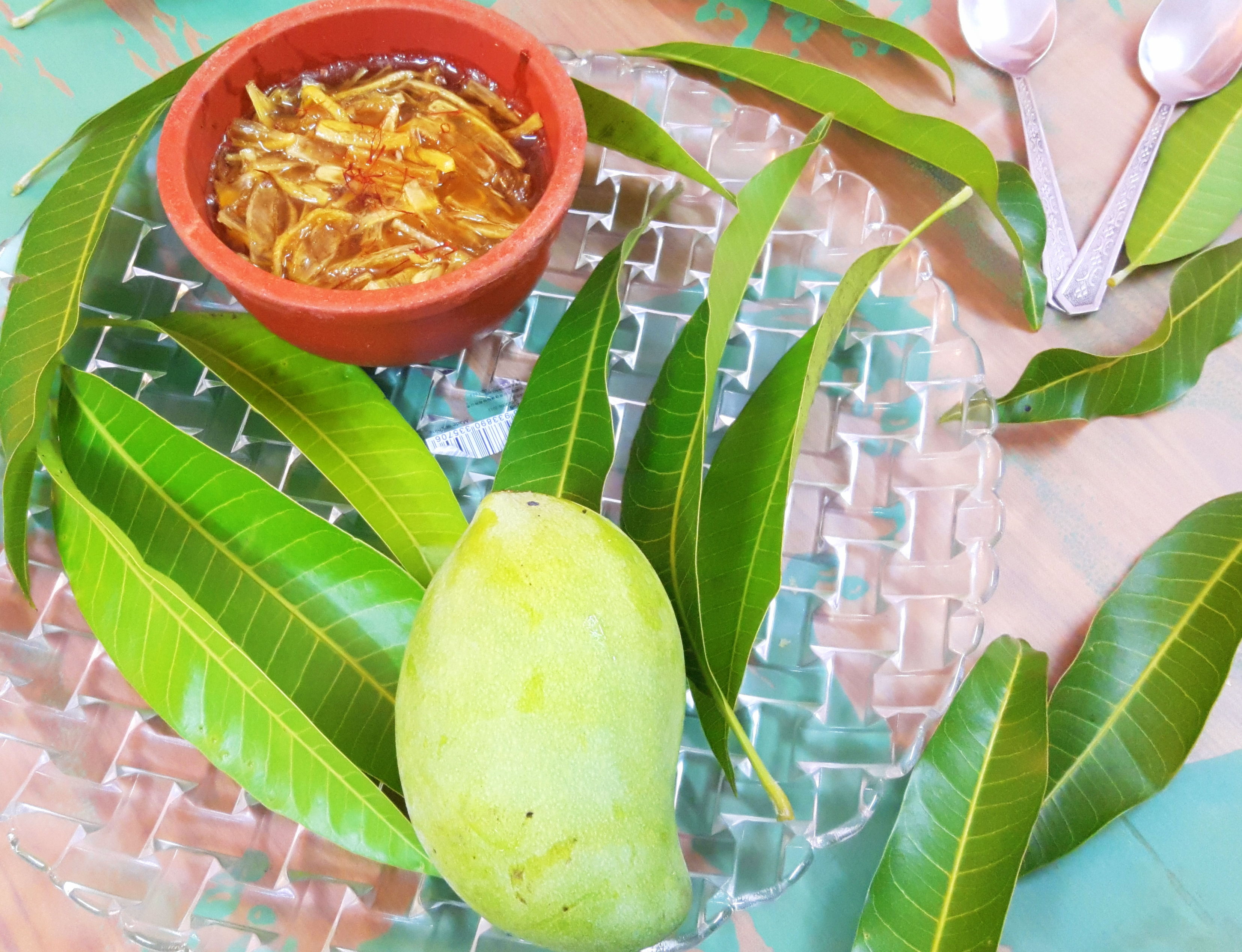 Raw mango sweet pickle with saffron and green cardamom (phalahari aam ka chhunda)