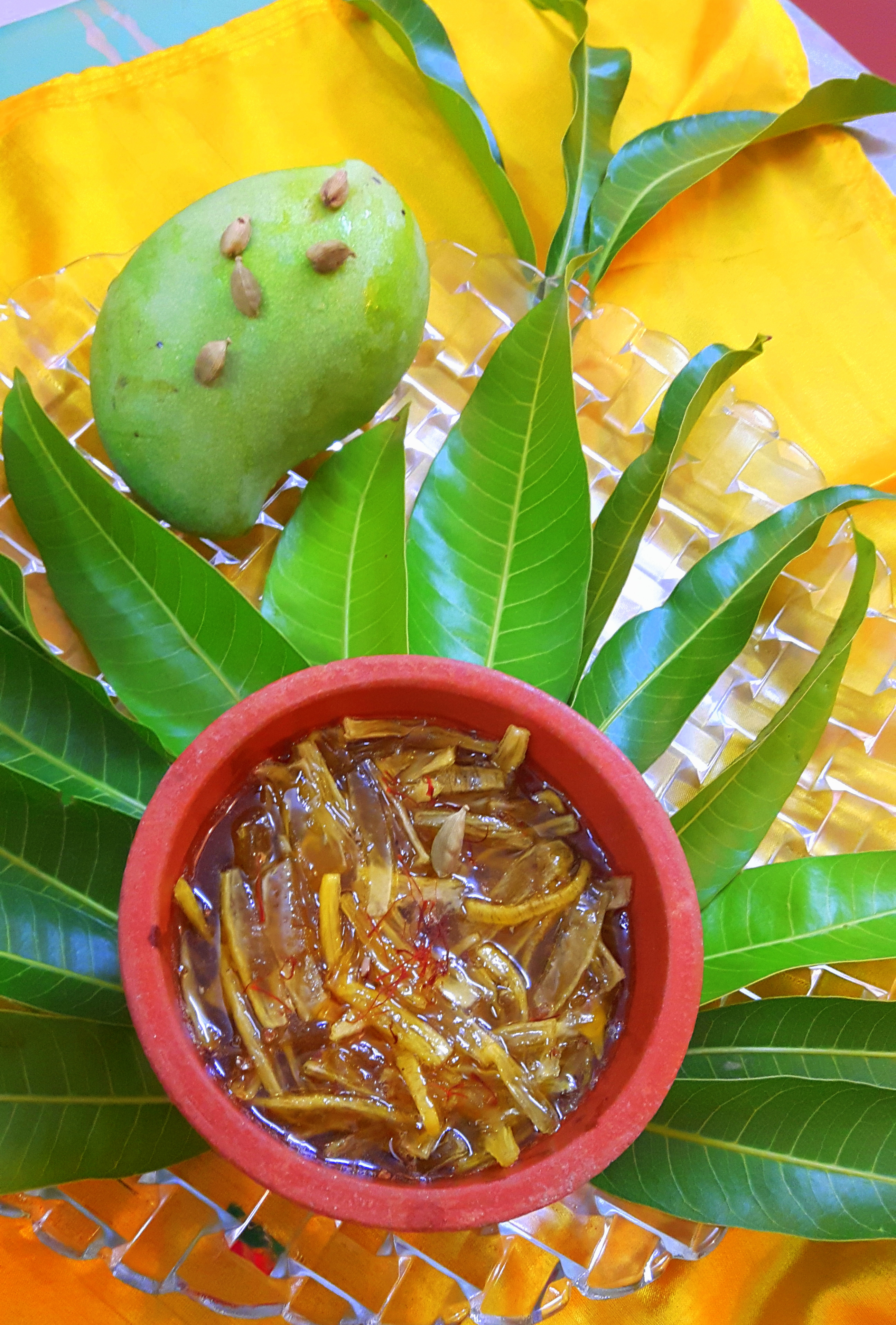 Raw mango sweet pickle with saffron and green cardamom (phalahari aam ka chhunda)