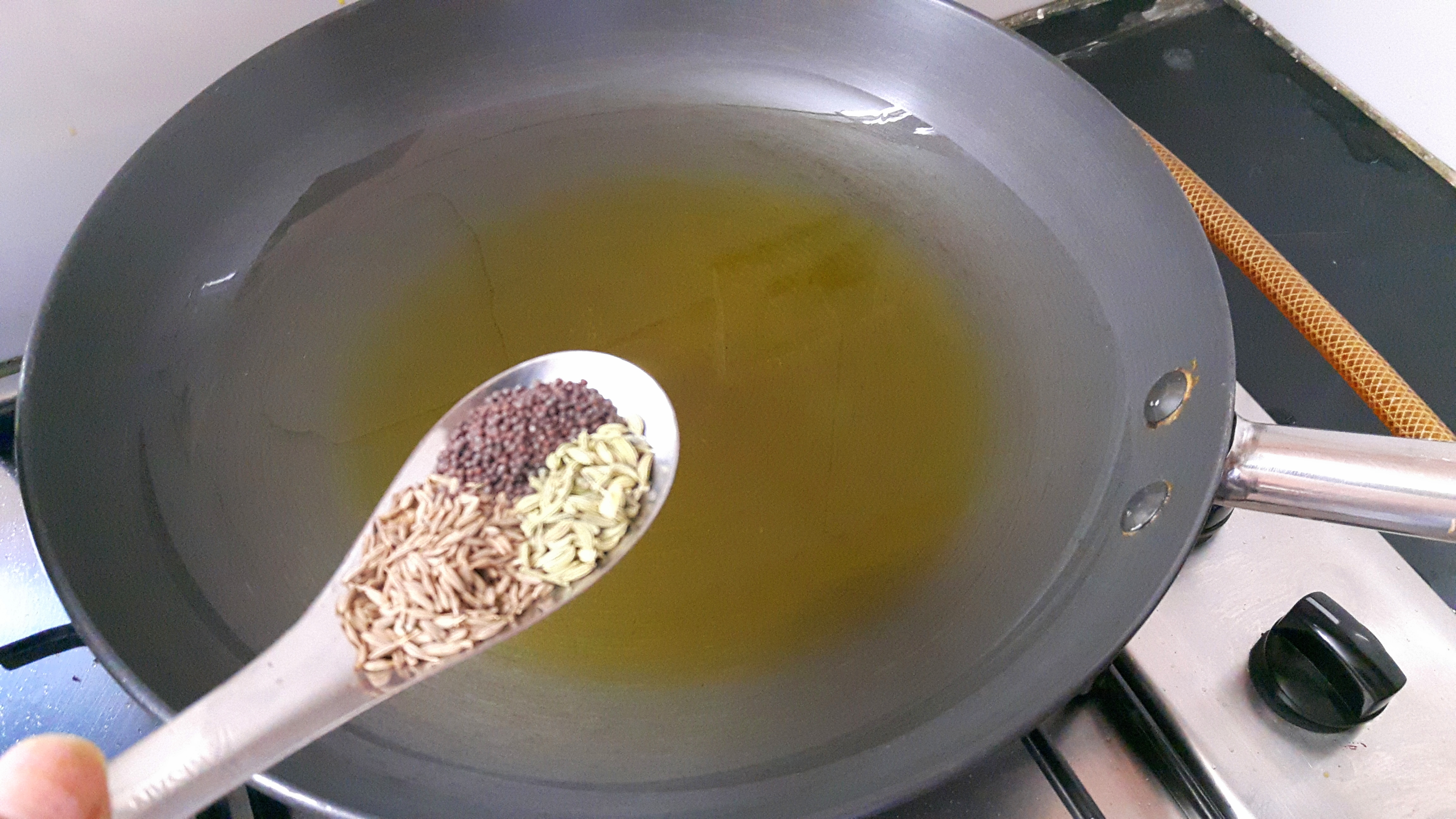 Add cumin seed, funnel seed and mustard seed