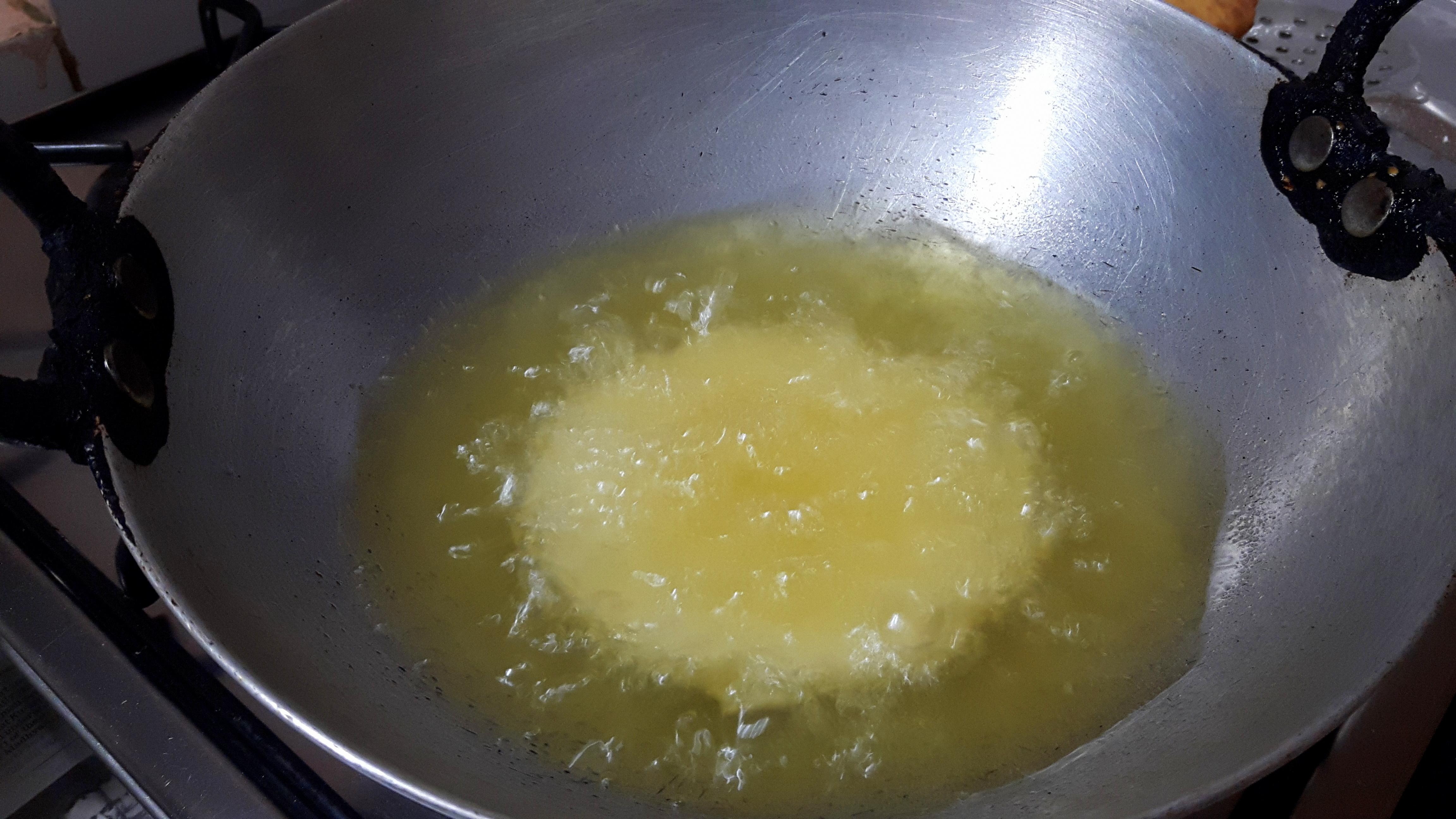 Deep fry the poori