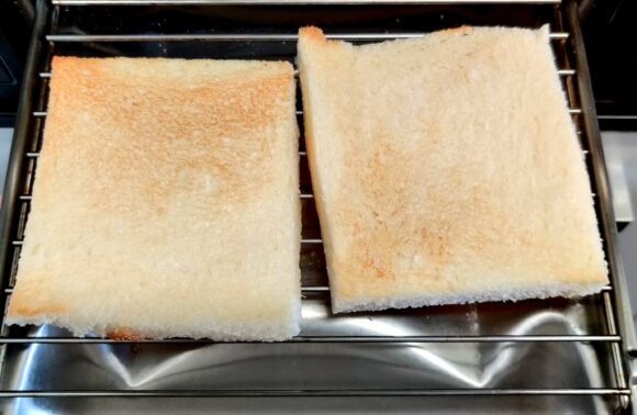 Grill the toast for about one minute each side