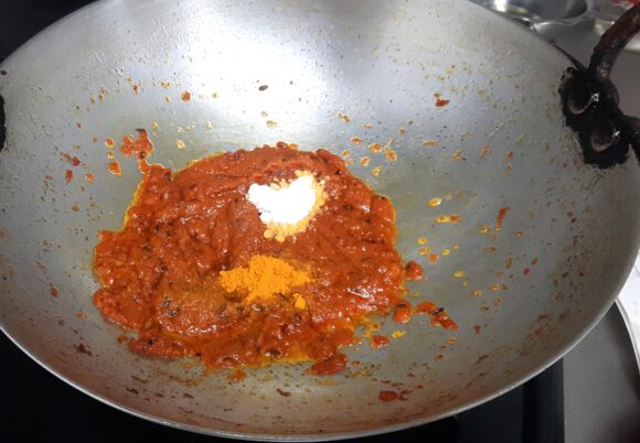 add salt, turmeric powder, chili powder, and coriander powder