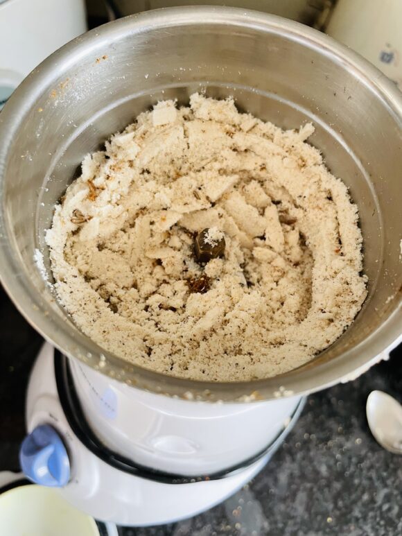 Grind the almond, cashew nut, black pepper, green cardamom and sugar