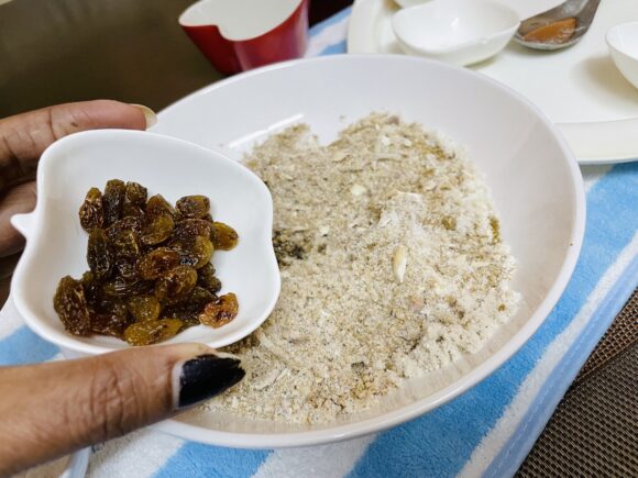 Adding  raisins 