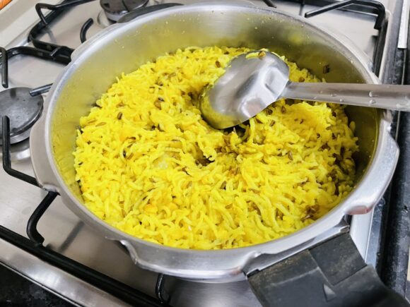 Adjust water later based on how thick or thin you want the khichdi.