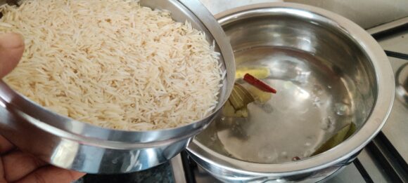 add rice and cook until 80% done,