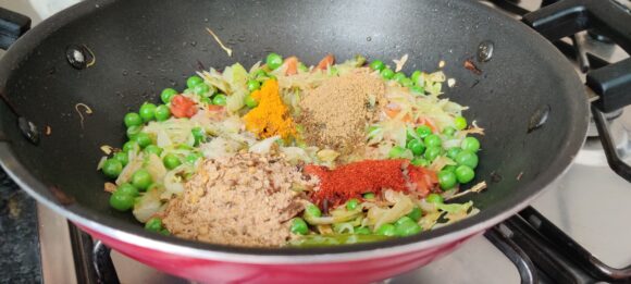 Add turmeric powder, chilli powder, coriander powder and salt