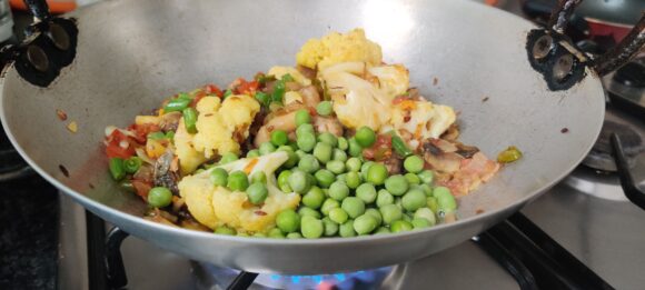Add butter and peas