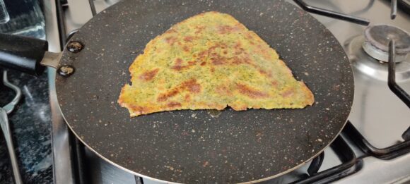apply some ghee and turn it, Cook both sides