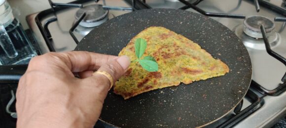apply some ghee and turn it, Cook both sides