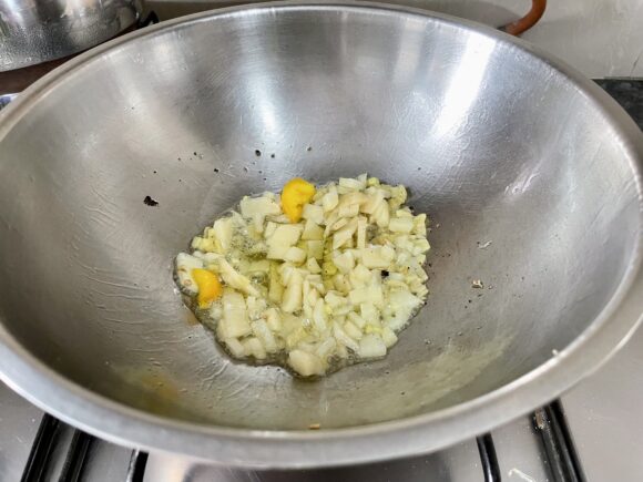 add cashew nut, stir fry on lower flame