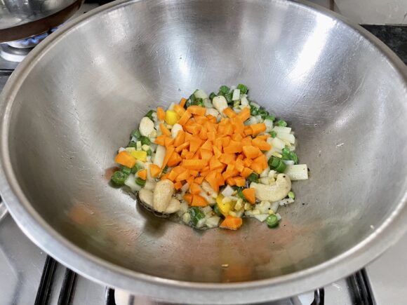 Add chopped carrot, tomato and onion