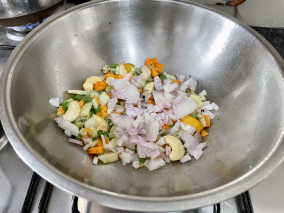 Add chopped carrot, tomato and onion