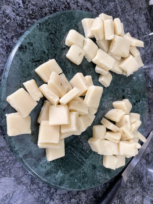 With a knife cut in square shapes, as shown in the photo. keep aside