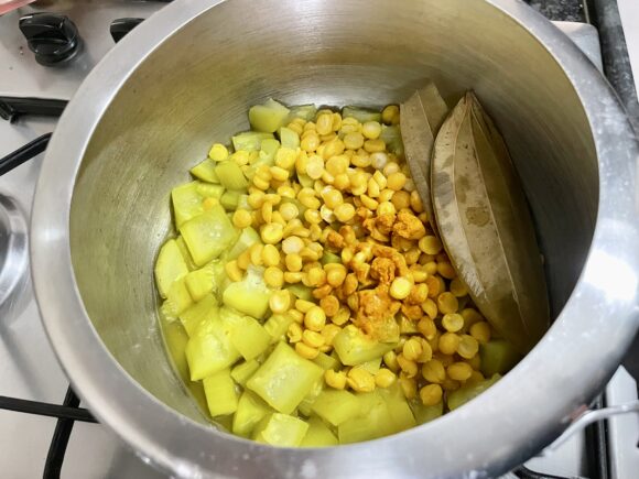 Put off the flame, allow cooker to cool and open