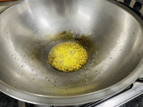 Add mustard, cumin and coriander