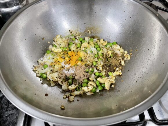 Add all dry powder masala and salt