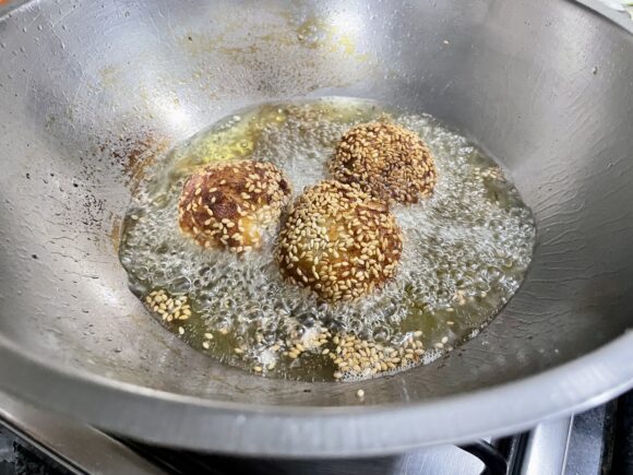 Deep fry the ball till golden colour appears all around;