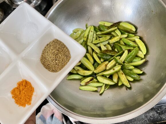 Add chilli powder, coriander powder, cumin powder, fennel seed powder and turmeric powder
