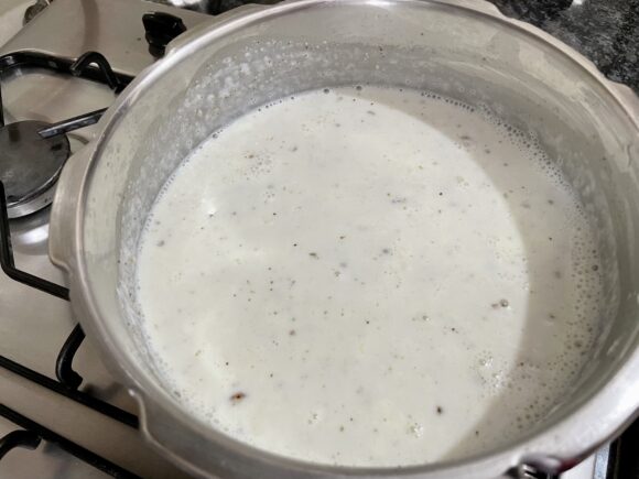 add boiled Bajra into reduced milk