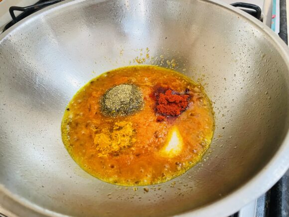 Add turmeric powder, coriander powder, cumin powder, chilli powder and salt