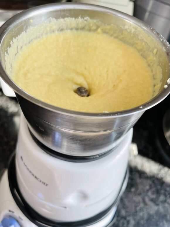 grind them with ginger; make fine, smooth and creamy paste.