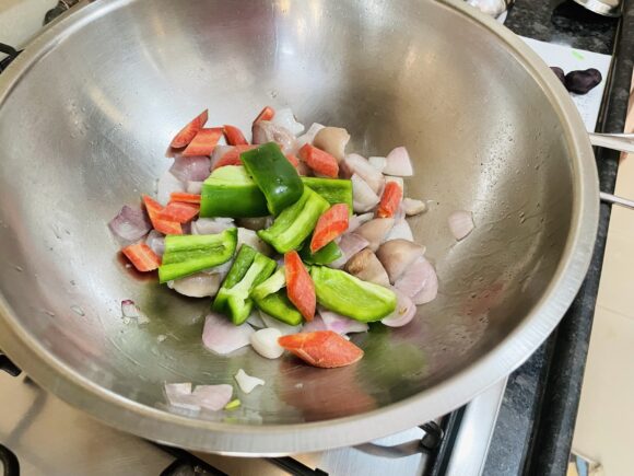 Add capsicum, and carrot; stir-fry for couple of minutes