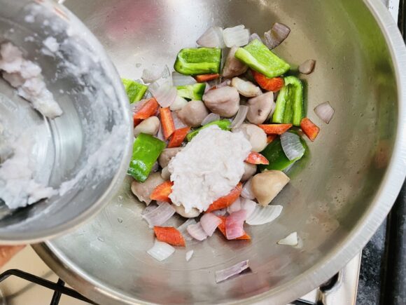Add this ground paste and salt into fried vegetables