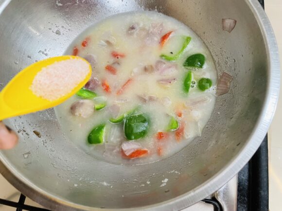 Add this ground paste and salt into fried vegetables