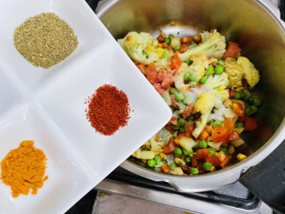 Add all powder masala