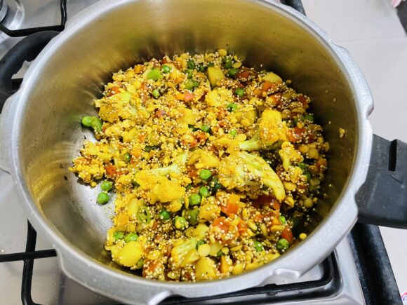 Add mixture of dal and quinoa