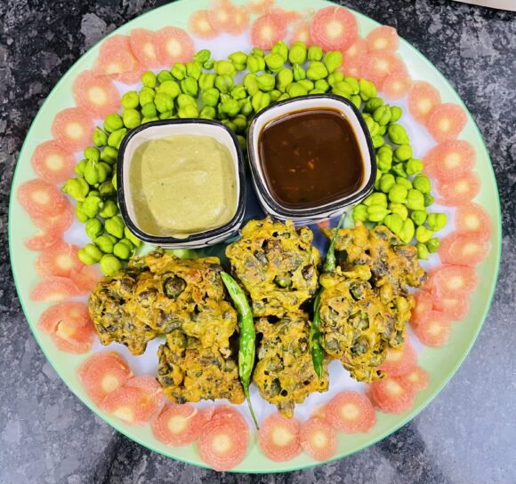 Fresh Green Chana Pakoda ( Fresh Green Chickpeas Fritters)”, serve piping hot 