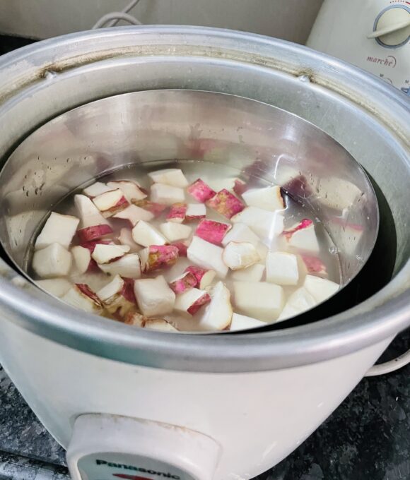 Add diced sweet potato on the top  to form a layer