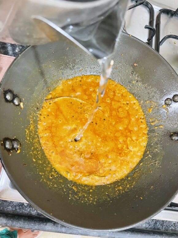 Add 1/2 cup of hot water