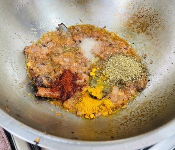 Add salt, chilli powder, coriander powder, cumin powder, turmeric powder