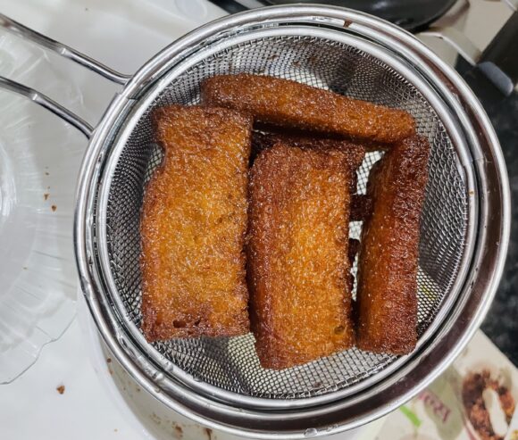 remove from syrup on strainer to remove extra syrup