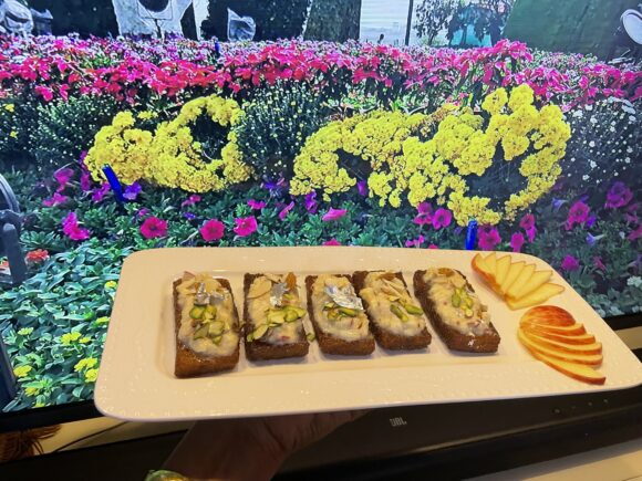 Decorate with sliced almond and pistachio