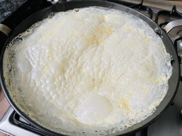 During slow cooking layer of malai (clotted cream) formed